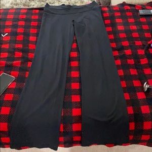 Lululemon very long flared yoga pants.